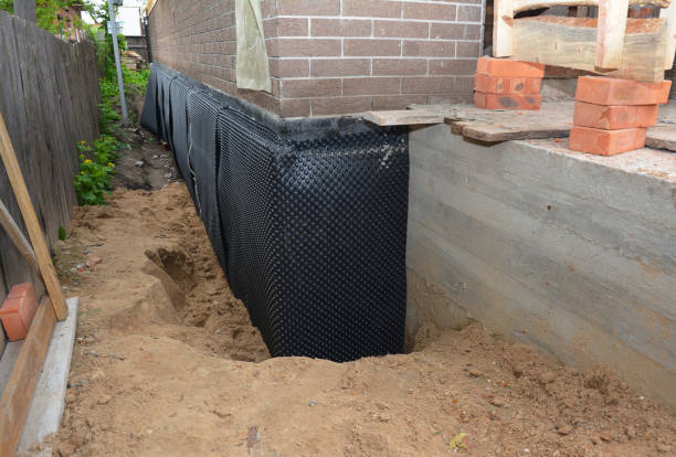 Happy homeowners after waterproofing job in Silver Point